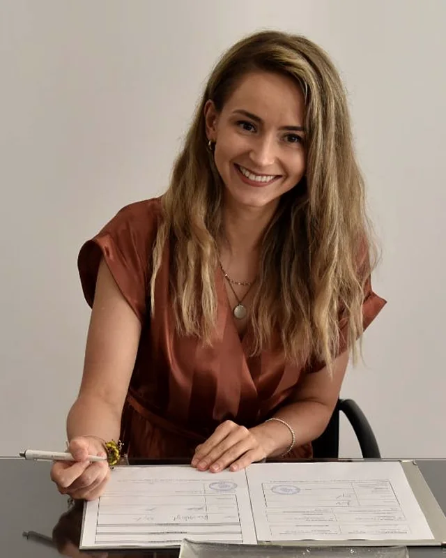Austra Cukura, product designer, at her desk
